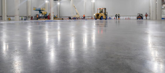 Other Benefits of Polished Concrete This image shows an industrial plant that has a polished floor.