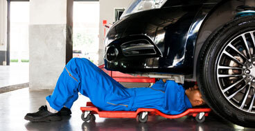 Resists Damage and Wear This image shows a man working on the car.