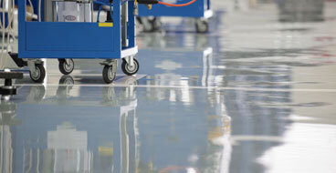 Low Maintenance Flooring This image shows an industrial plant that has an epoxy floor.