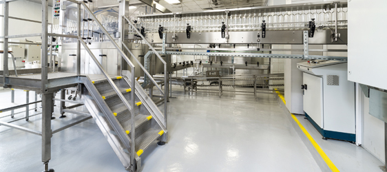 Industrial Epoxy Floor Coating This image shows an industrial plant that has an epoxy floor.