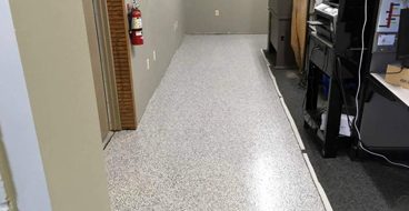 Commercial Epoxy Office This image shows a commercial space with white epoxy floor.