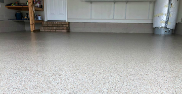 Epoxy Flooring Nampa This image shows a garage floor with flake epoxy painted floor.