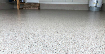 Garage Epoxy This image shows a garage floor with flake epoxy painted floor.