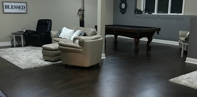 This image shows a living room with an epoxy floor.