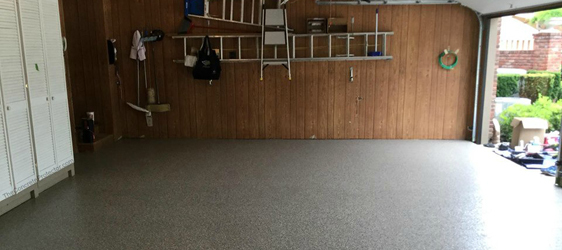 Metallic Epoxy Garage Floor This image shows a garage floor with flake epoxy painted floor.