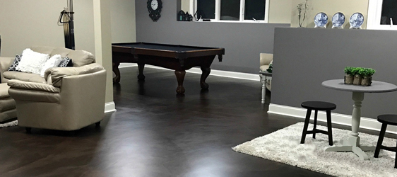 Epoxy This image shows a living room with an epoxy floor.