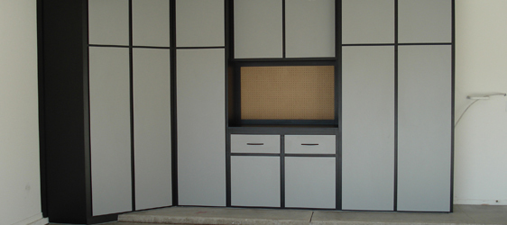 garage wall cabinets This image shows custom cabinets in a garage.