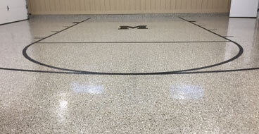 slip-resistant-surface This image shows a basketball court.