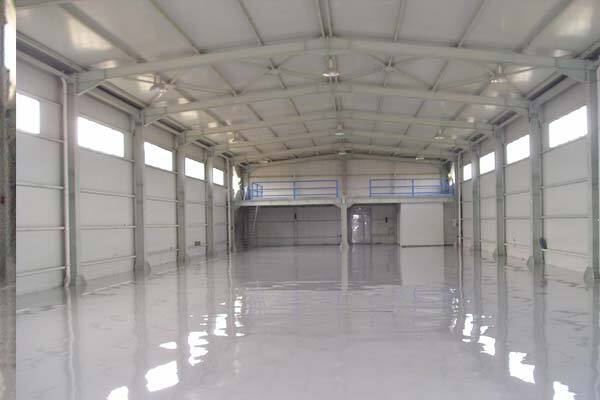 Commercial Epoxy Coatings This image shows a commercial space with white epoxy floor.
